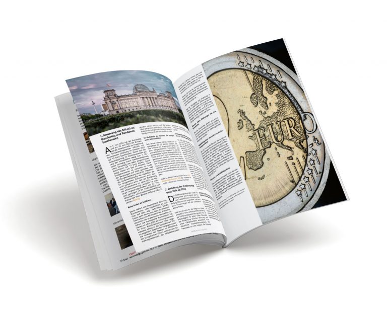 Offene Zeitschrift mit Euro-Münze, Bezug zur Wirtschaft und Bauwirtschaft.